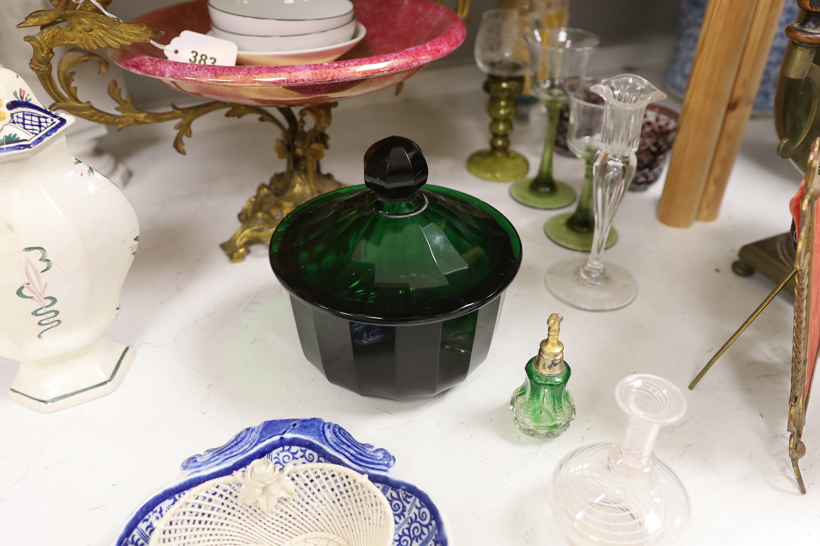 A French ruby lustre and ormolu mounted centrepiece, a green faceted glass bowl and cover, two Nymphenburg dishes, a pearlware dessert dish and other ceramics and glass